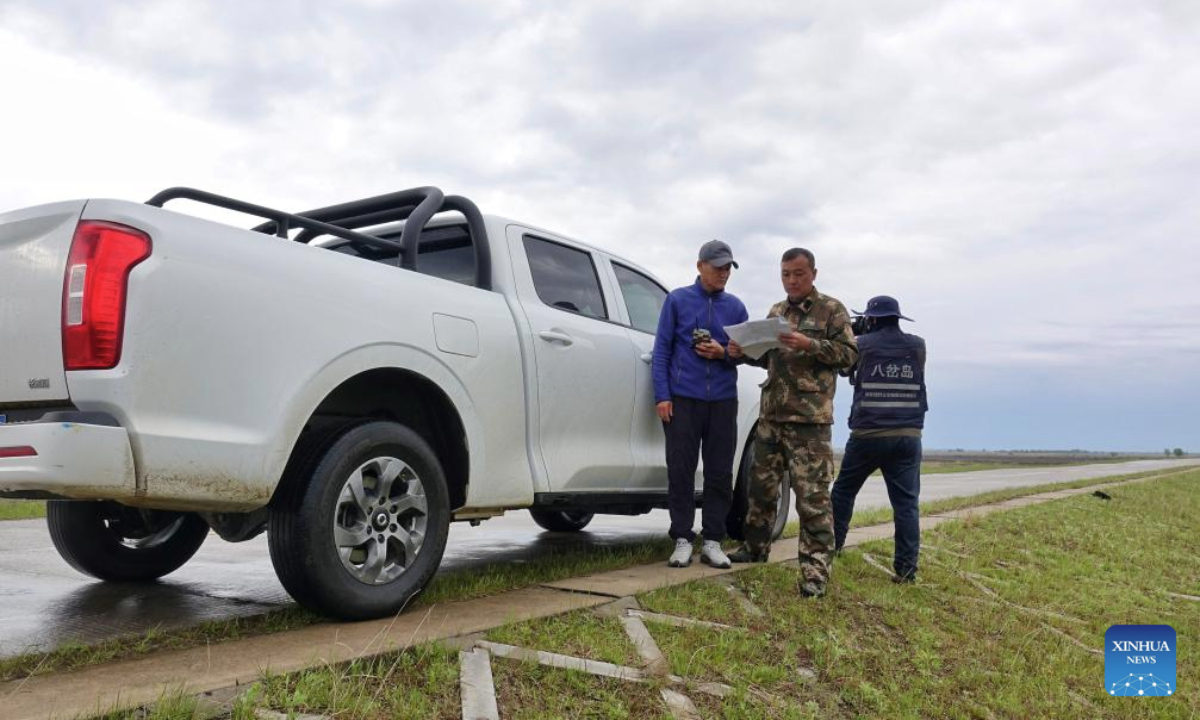 Staff members conduct regular field patrol at the Bachadao National Nature Reserve in Tongjiang, northeast China's Heilongjiang Province, May 19, 2025. Recently, northbound migratory birds have entered their breeding season at the reserve, a critical habitat and stopover site, where ongoing wetland restoration efforts have ensured food resources and habitats for these avian travelers. (Photo by Liu Wanping/Xinhua)