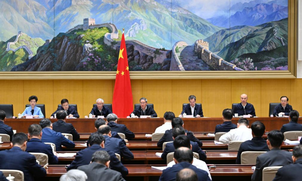 Chinese Premier Li Qiang, also a member of the Standing Committee of the Political Bureau of the Communist Party of China (CPC) Central Committee, speaks at a State Council meeting on promoting the domestic economy, on May 15, 2025. The meeting was chaired by Vice Premier Ding Xuexiang, who is also a member of the Standing Committee of the Political Bureau of the CPC Central Committee. (Xinhua/Rao Aimin)