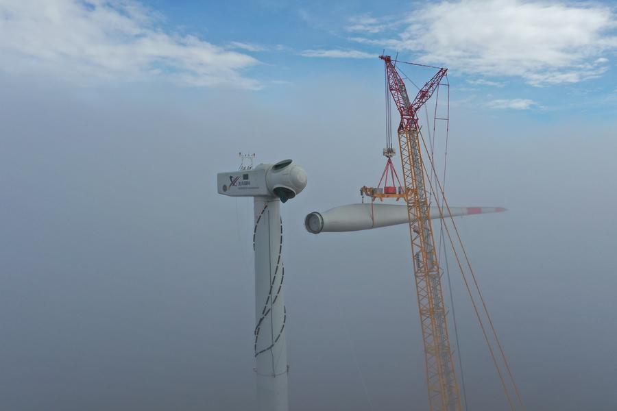 A wind turbine blade is installed at the construction site of the Senj Wind Farm in Senj, Croatia, Sept. 27, 2020. (Photo by Ding Decai/Xinhua)