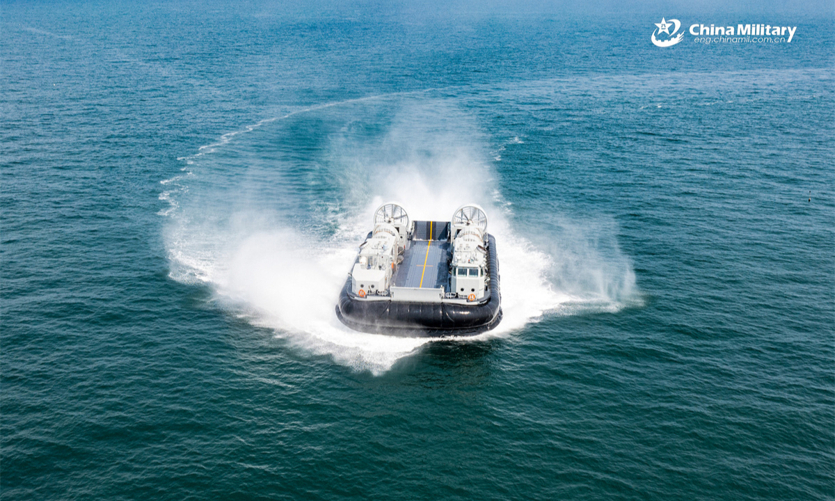 A landing craft air cushion (LCAC) attached to a landing ship group with the navy under the Chinese PLA Southern Theater Command steams to beach-head at lightning speed during a maritime training exercise. (eng.chinamil.com.cn/Photo by Mi Xuechao)