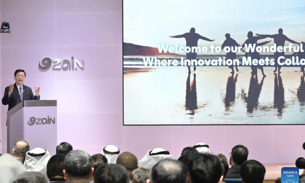 John Lee, chief executive of the Hong Kong Special Administrative Region (HKSAR), speaks while visiting Zain Group, a major mobile telecommunications company in Kuwait City, Kuwait, May 14, 2025. (Information Services Department of the Government of the HKSAR/Handout via Xinhua)