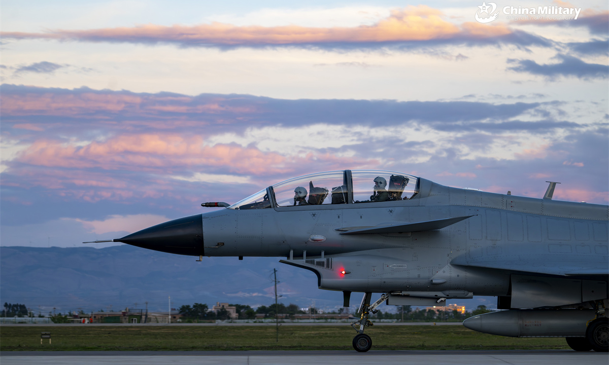 A J-10 fighter jet attached to the Chinese PLA Air Force taxis on the runway during a round-the-clock flight training exercise, aiming to test the pilots' cooperative combat capabilities. (eng.chinamil.com.cn/Photo by Xiao Rui)