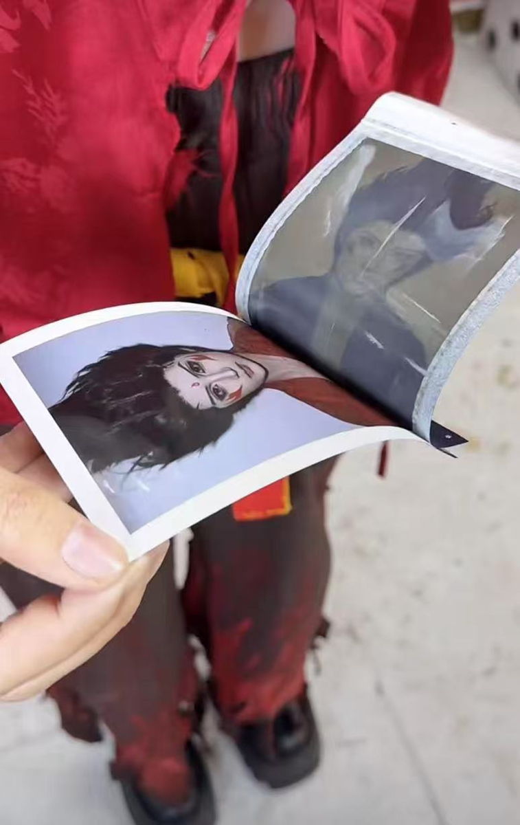 A customer peels apart a photo. Photo: Courtesy of Yiyi