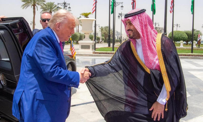 Saudi Crown Prince and Prime Minister Mohammed bin Salman Al Saud (R) welcomes visiting U.S. President Donald Trump in Riyadh, Saudi Arabia, on May 13, 2025. (Saudi Press Agency/Handout via Xinhua)
