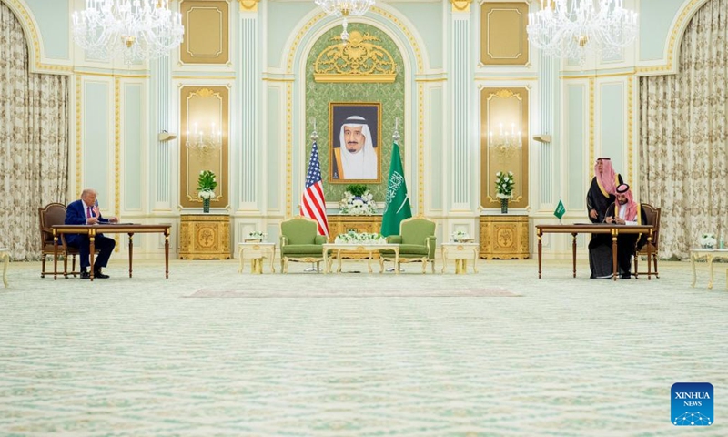 Saudi Crown Prince and Prime Minister Mohammed bin Salman Al Saud (1st R) and U.S. President Donald Trump (1st L) sign agreements in Riyadh, Saudi Arabia, on May 13, 2025. (Saudi Press Agency/Handout via Xinhua)