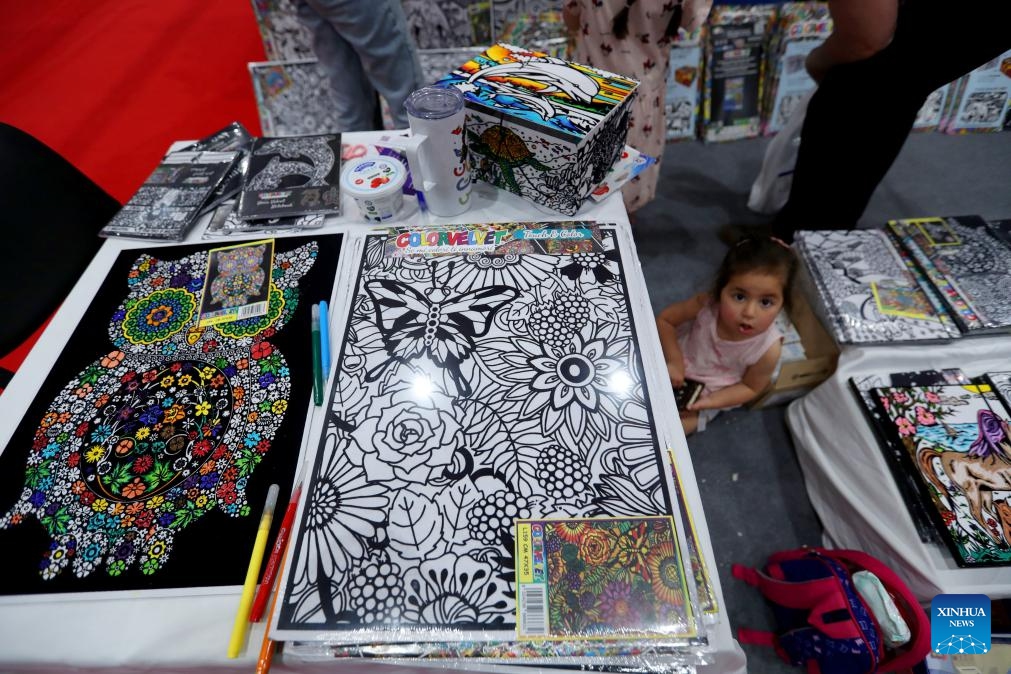 A girl is seen during the 66th Beirut Arab Book Fair in Beirut, Lebanon, on May 16, 2025. The book fair is held here from May 15 to 25. (Photo: Xinhua)