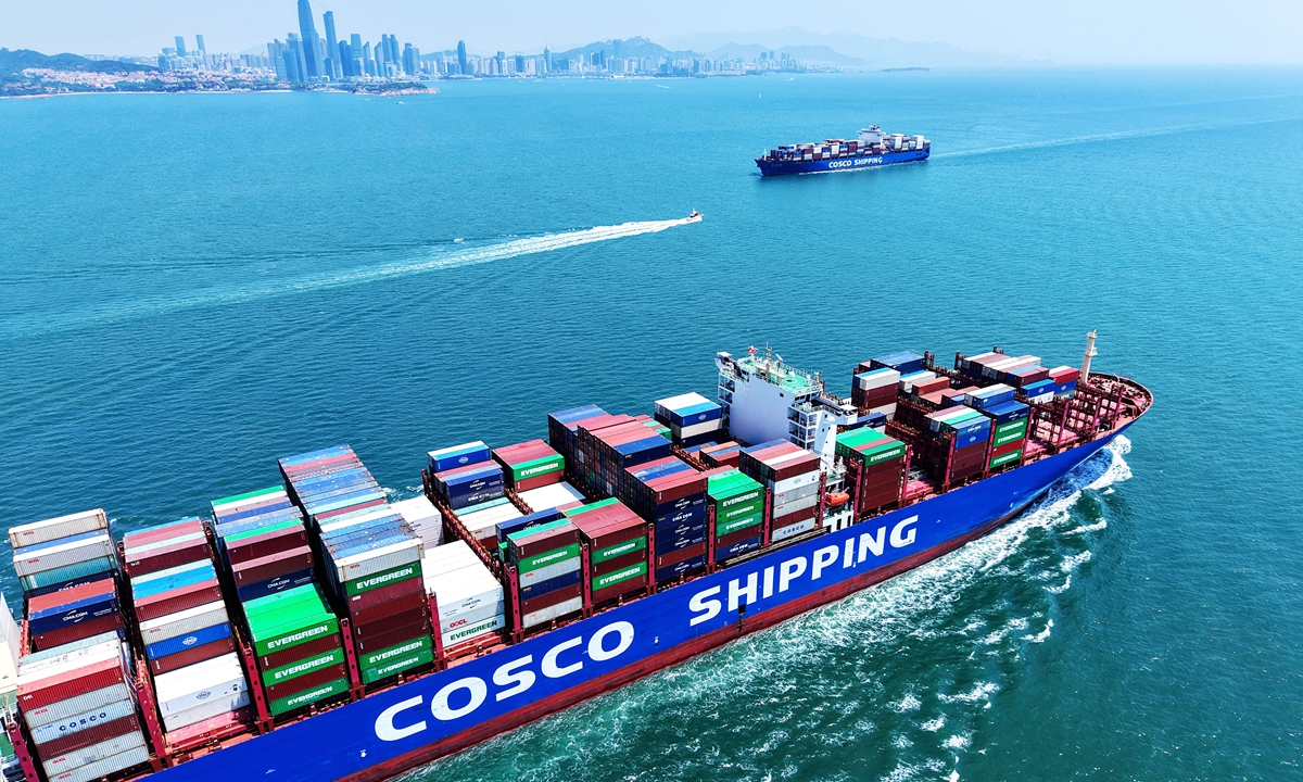 A cargo ship loaded with containers departs from the port of Qingdao in East China's Shandong Province on May 18, 2025. Photo: VCG