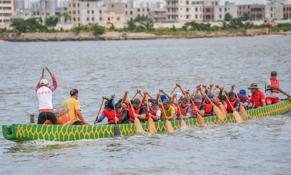 Local fishermen train for an international dragon boat race in waters off Xinbu island, Haikou, South China's Hainan Province, on May 21, 2025. The race is traditional activity for the annual Dragon Boat Festival, which falls on May 31 this year. Photo: VCG