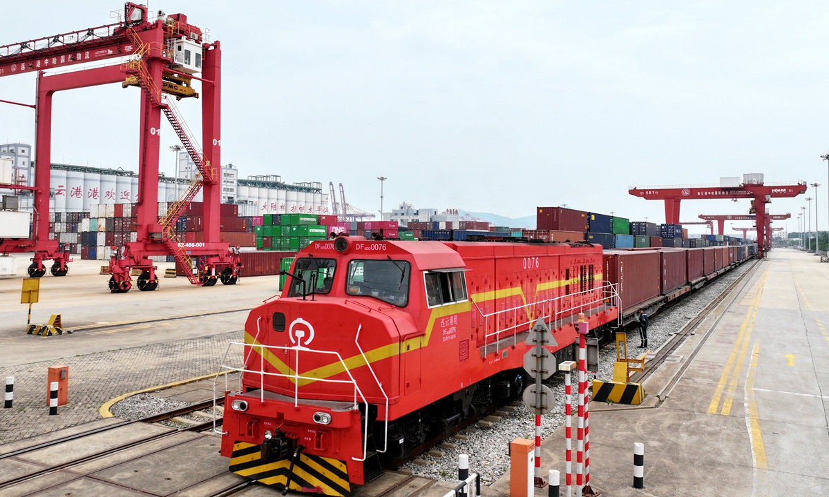 A China-Europe freight train loaded with containers prepares to depart from a logistics base in Lianyungang, East China's Jiangsu Province, on May 22, 2025. Official data showed that 1,792 China-Europe freight trains operated across China in April, a 9 percent year-on-year increase. Photo: VCG