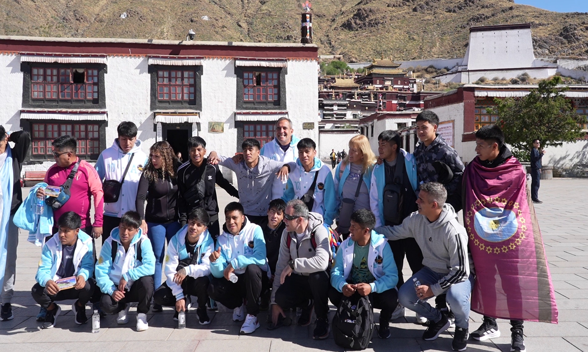 Members of the Argentine Salta delegation team take a group photo while visiting Tashilhunpo Monastery in Xigaze on May 19, 2025. 