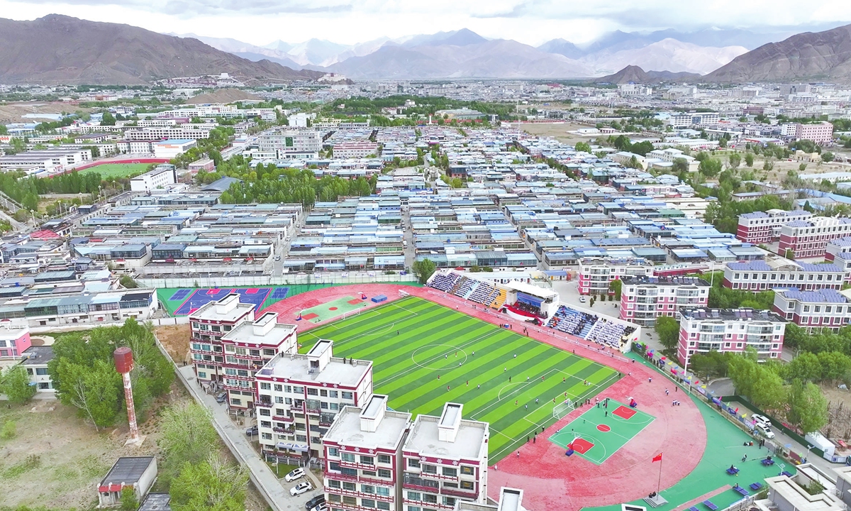 Aerial view shows the football field of Shanghai Experimental Middle School in Xigaze, where the friendly football match is held  on May 20, 2025.