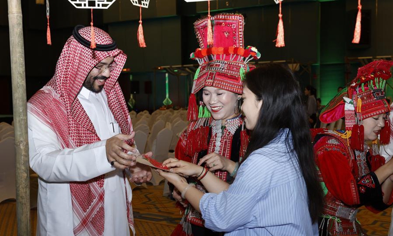 An audience participates in a cultural exchange event held at the Cultural Palace in the Diplomatic Quarter of Riyadh, Saudi Arabia, on May 13, 2025. China's Yunnan Province opened a cultural exhibition in the Saudi capital Riyadh. Photo: Xinhua