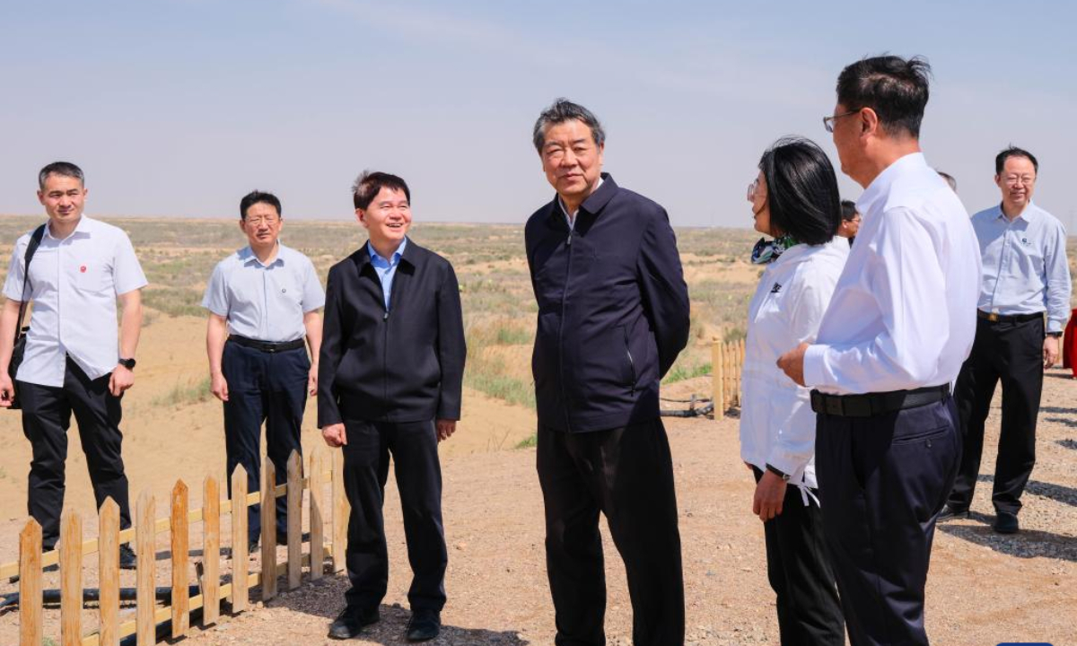 Chinese Vice Premier He Lifeng, also a member of the Political Bureau of the Communist Party of China Central Committee, visits the site of a quicksand control project along the Yellow River in north China's Inner Mongolia Autonomous Region, May 27, 2025. He on Tuesday attended a meeting on advancing desertification control for the meandering bends of the Yellow River in Bayannur, north China's Inner Mongolia Autonomous Region. (Xinhua/Ma Jinrui)