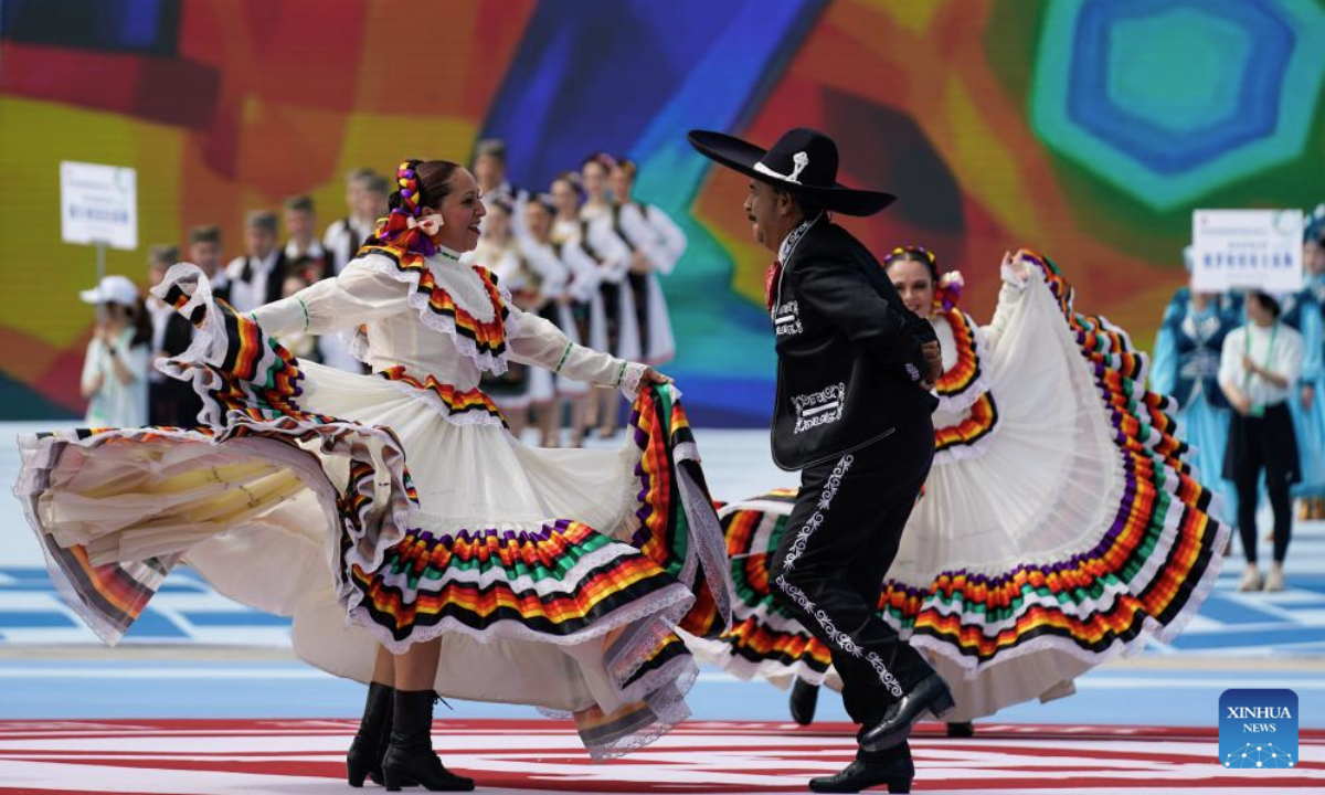 Artists perform during the opening ceremony of the 9th International Festival of the Intangible Cultural Heritage held in Chengdu, southwest China's Sichuan Province, May 28, 2025. The festival kicked off here on Wednesday, during which over 600 items of intangible cultural heritage from more than 60 countries and regions will be displayed. (Xinhua/Xu Bingjie)