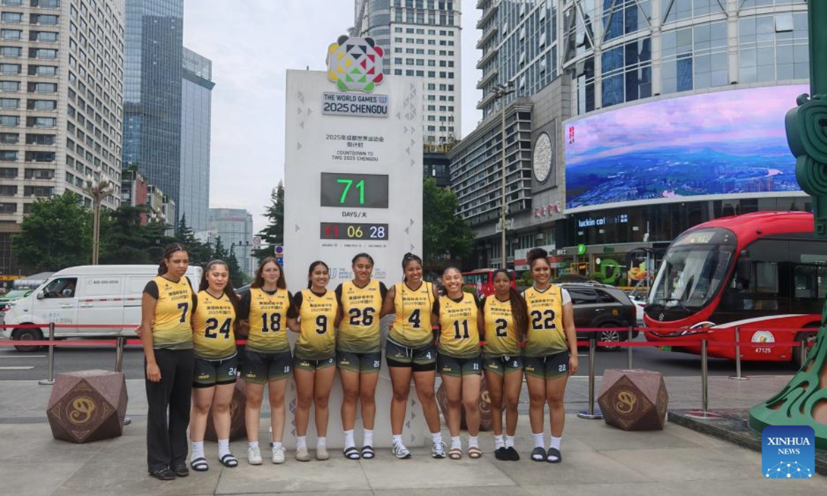 Members of Lincoln High School women's flag football team pose for a group photo in front of a countdown clock to the World Games 2025 in Chengdu, southwest China's Sichuan Province, May 28, 2025. The team is in China for the sports and cultural exchange activities between Chinese and American youth at the invitation of the Chinese People's Association for Friendship with Foreign Countries. (Xinhua)