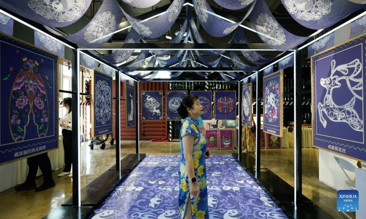 Visitors tour the 9th International Festival of the Intangible Cultural Heritage held in Chengdu, southwest China's Sichuan Province, May 28, 2025. The festival kicked off here on Wednesday, during which over 600 items of intangible cultural heritage from more than 60 countries and regions will be displayed. (Xinhua/Xu Bingjie)