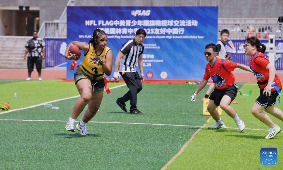 Students of Lincoln High School and Chengdu Foreign Languages School compete during a friendly match of the NFL FLAG China-U.S. Youth Flag Football Exchange Event & Lincoln High School 2025 China Tour in Chengdu, southwest China's Sichuan Province, May 28, 2025. The team is in China for the sports and cultural exchange activities between Chinese and American youth at the invitation of the Chinese People's Association for Friendship with Foreign Countries. (Xinhua)