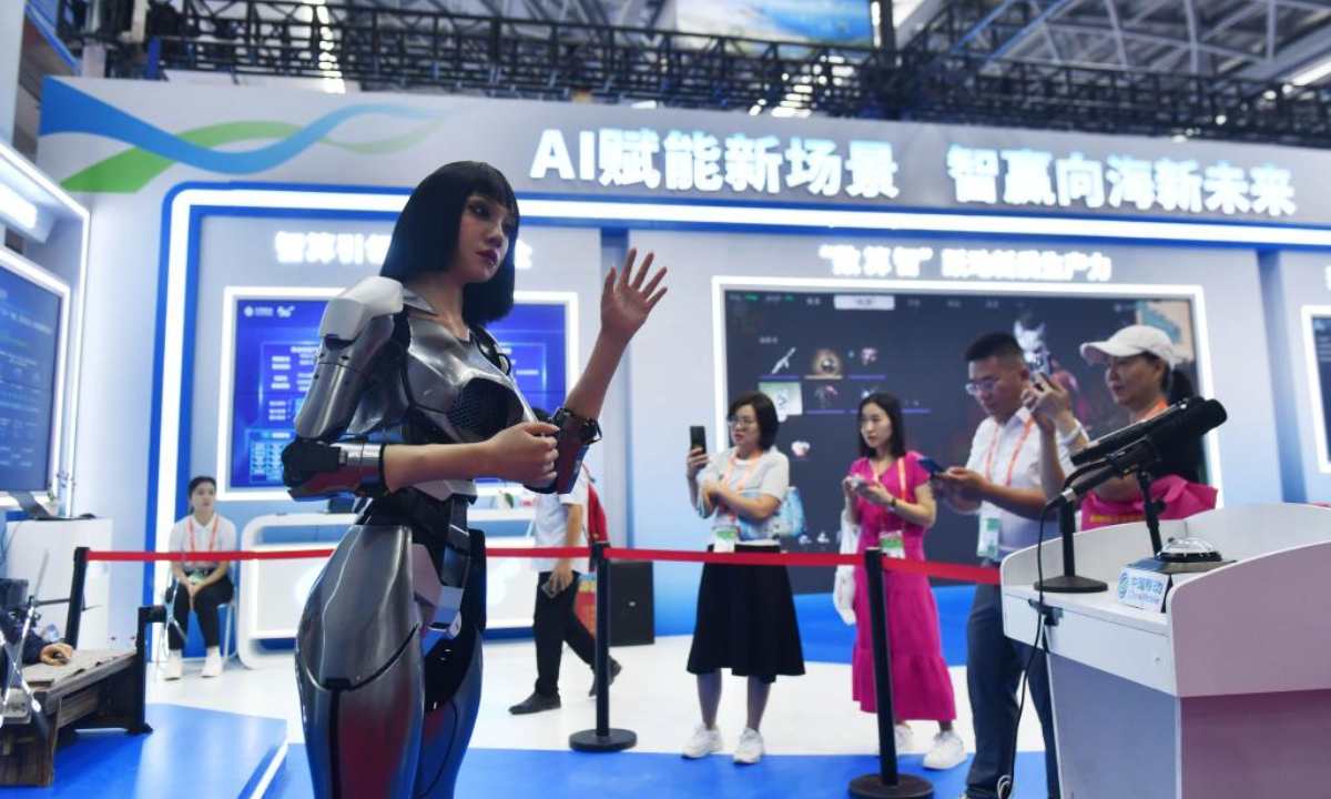 An interactive robot gestures at the 21st China-ASEAN Expo in Nanning, south China's Guangxi Zhuang Autonomous Region, Sept. 26, 2024.  (Xinhua/Huang Haoming)