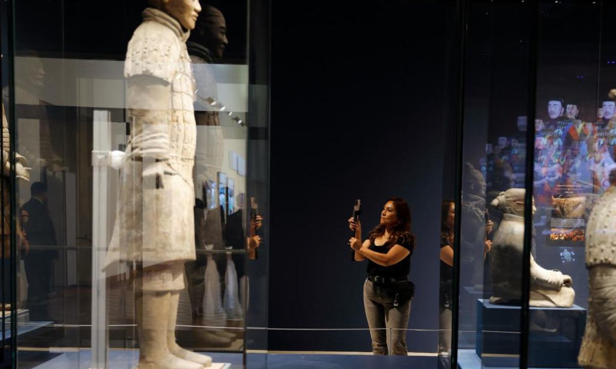 A woman visits the exhibition World of the Terracotta Warriors: New Archaeological Discoveries in Shaanxi in the 21st Century at the Bowers Museum in Orange County, California, the United States, May 22, 2025. (Photo by Qiu Chen/Xinhua)