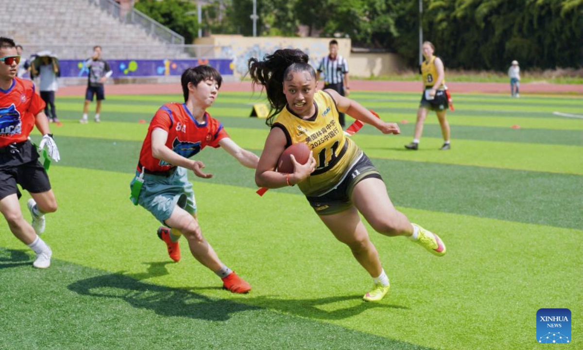 Students of Lincoln High School and Chengdu Foreign Languages School compete during a friendly match of the NFL FLAG China-U.S. Youth Flag Football Exchange Event & Lincoln High School 2025 China Tour in Chengdu, southwest China's Sichuan Province, May 28, 2025. The team is in China for the sports and cultural exchange activities between Chinese and American youth at the invitation of the Chinese People's Association for Friendship with Foreign Countries. (Xinhua)