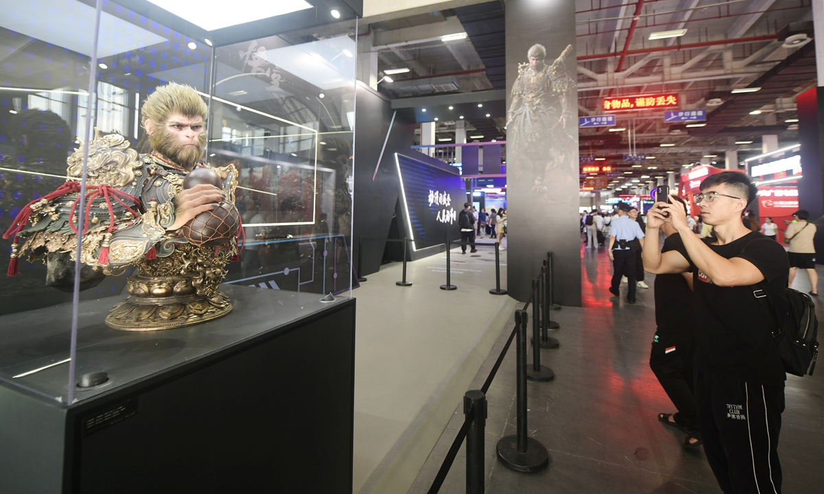 A visitor admires the design of the 