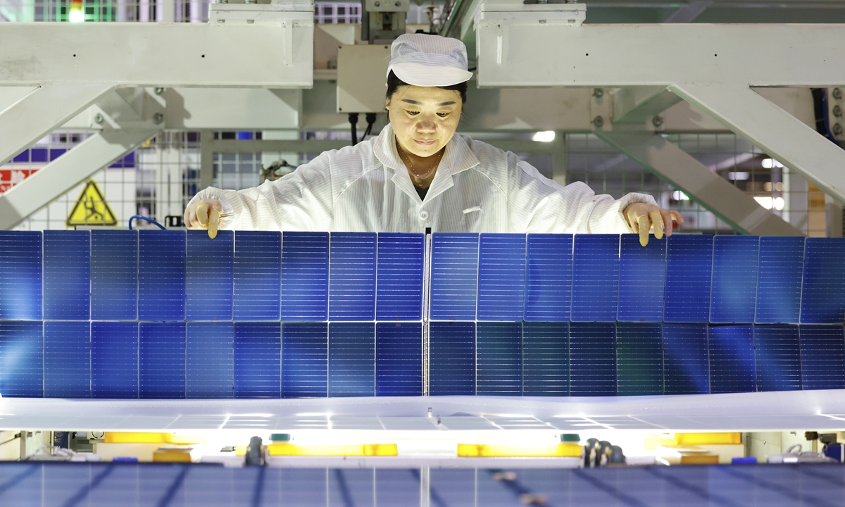 A worker checks solar panels for export at a 5G intelligent workshop in Suqian, East China's Jiangsu Province, on June 2, 2025. According to data released by China's General Administration of Customs, the nation's exports of photovoltaic products have exceeded 200 billion yuan ($27.76 billion) for four consecutive years in 2024. Photo: VCG