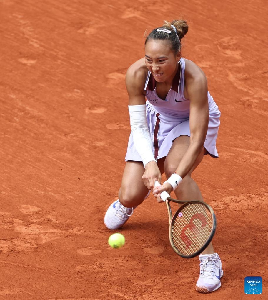 Zheng Qinwen returns a shot during the women's singles 4th round match between Liudmila Samsonova of Russia and Zheng Qinwen of China at the French Open tennis tournament at Roland Garros, Paris, France, June 1, 2025. (Xinhua/Li Jing)
