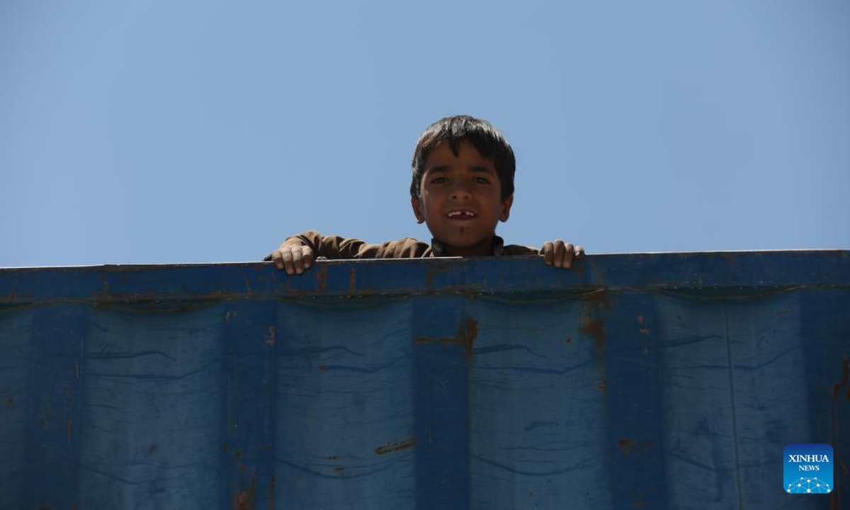An Afghan child is seen at a temporary camp in Kabul, capital of Afghanistan, June 2, 2025. A total of 500,000 Afghan refugees have returned to their homeland Afghanistan from neighboring Pakistan and Iran in April and May, according to the United Nations High Commissioner for Refugees (UNHCR). (Photo by Saifurahman Safi/Xinhua)