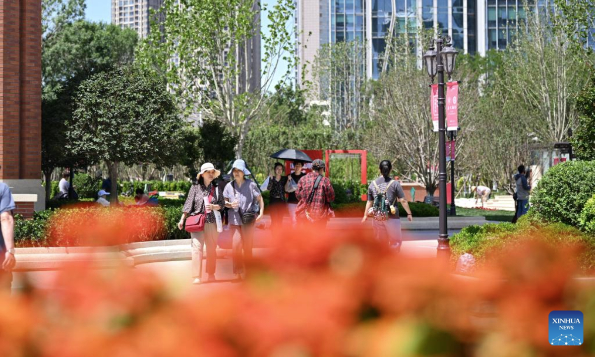 People take a walk at a pocket park in Heping District of Tianjin, north China, June 3, 2025.

In recent years, Tianjin, a major city in northern China, has revitalized small urban spaces by building over 300 pocket parks, strategically scattered across residential areas, streets, and commercial districts. These green oases are helping shape a livable urban ecosystem where residents enjoy green views from windows and easy park access. (Xinhua/Li Ran)