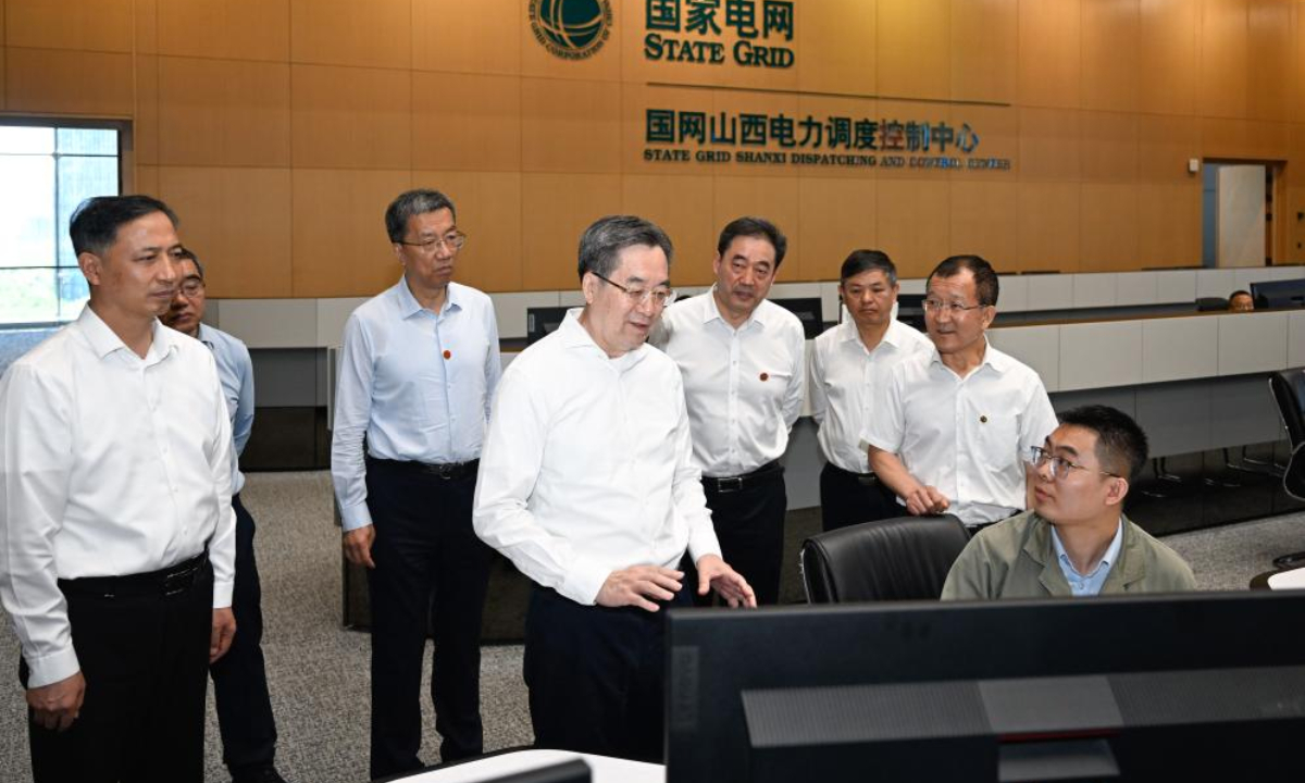 Chinese Vice Premier Ding Xuexiang, also a member of the Standing Committee of the Political Bureau of the Communist Party of China Central Committee, visits a local company under the State Grid in north China's Shanxi Province, June 4, 2025. Ding inspected preparations for the college entrance examination and energy sector reforms in north China's Shanxi Province from Tuesday to Wednesday, emphasizing the need to uphold fairness and ensure safety in the national examination, also known as Gaokao. (Xinhua/Shen Hong)