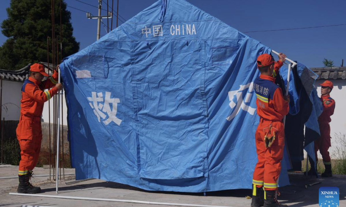Rescuers set up a temporary shelter at Baicao Village of Eryuan County in Dali Bai Autonomous Prefecture, southwest China's Yunnan Province, June 5, 2025.

A 5.0-magnitude earthquake struck Eryuan County at 4:31 a.m. Thursday (Beijing Time), according to the China Earthquake Networks Center (CENC).

The epicenter was monitored at 26.26 degrees north latitude and 100.03 degrees east longitude. The quake struck at a depth of 10 km, said a report issued by the CENC.

The quake was strongly felt in Eryuan County, Dali City and Heqing County, waking some residents. Local authorities in Eryuan County have promptly initiated an emergency response, with townships assessing the impact. (Photo by Luo Xincai/Xinhua)