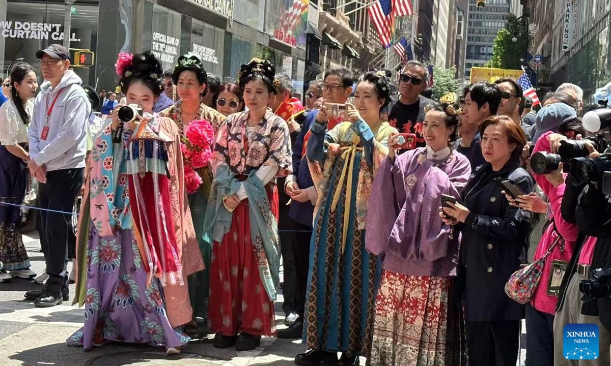 People in traditional Chinese costumes take part in a celebration of Asian American and Pacific Islander (AAPI) Heritage Month in New York, the United States, on June 1, 2025. (Photo by Qin Mingwei/Xinhua)