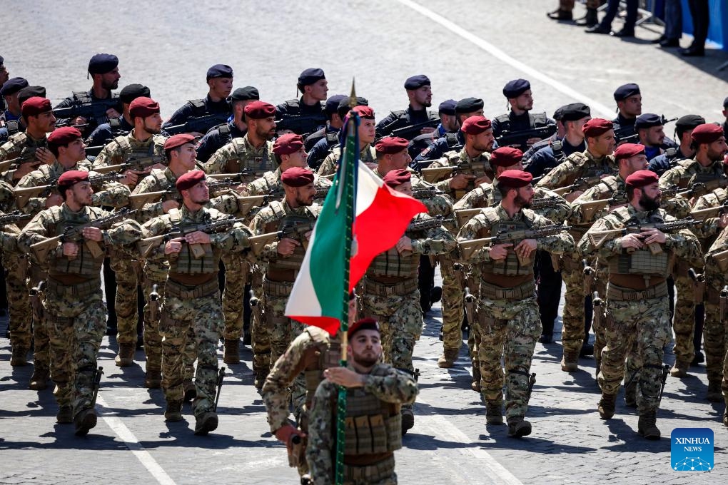 Soldiers parade during the Republic Day celebrations in Rome, Italy, June 2, 2025. Italy on Monday marked the 79th anniversary of its founding as a republic, with President Sergio Mattarella calling for peace and international cooperation. (Photo by Alberto Lingria/Xinhua)