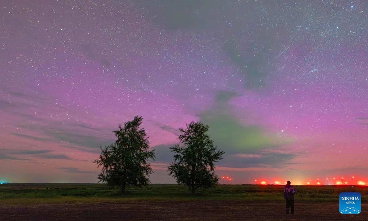This photo taken on June 1, 2025 shows a view of aurora in Fujin City, Jiamusi City, northeast China's Heilongjiang Province. (Photo by Qu Yubao/Xinhua)