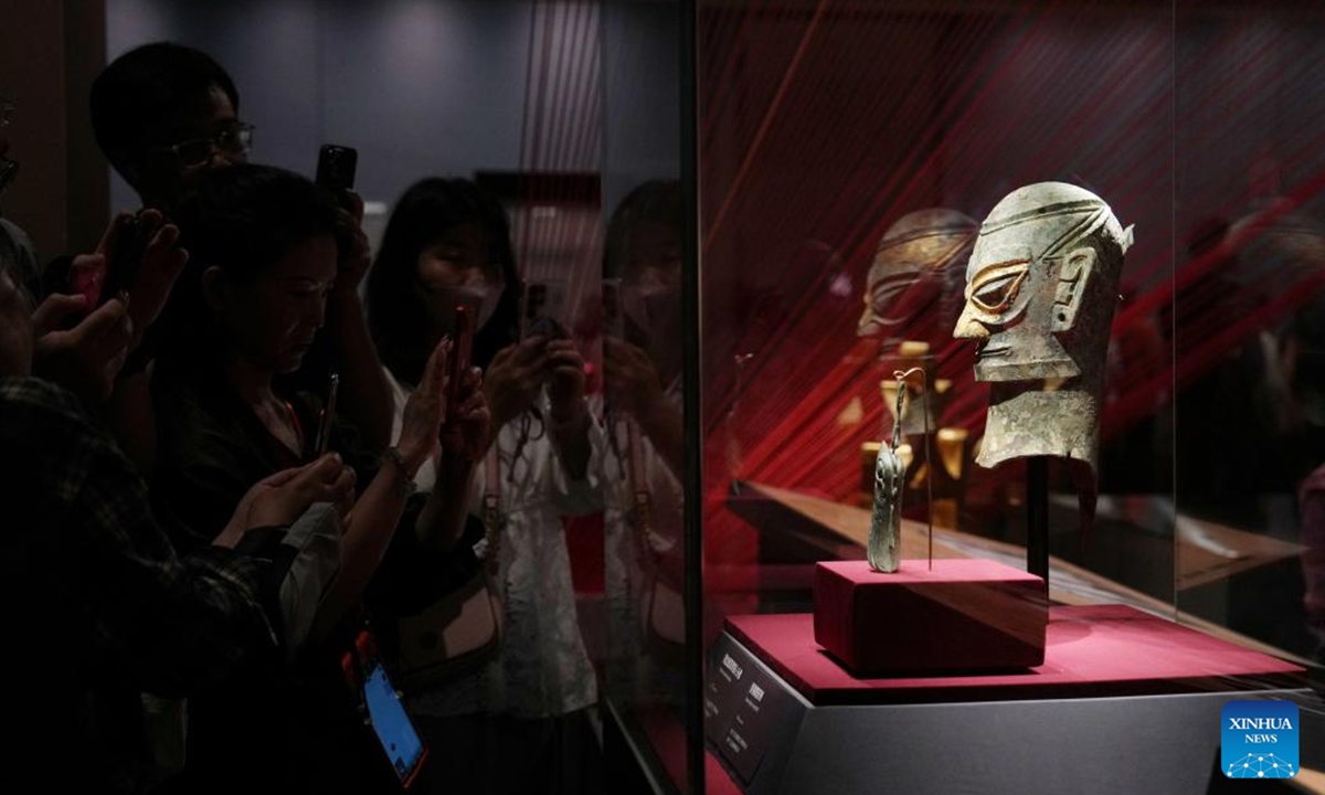 Visitors view an exhibit at the exhibition This is the Shang at the Grand Canal Museum of Beijing in Beijing, capital of China, June 2, 2025. People enjoy the 3-day holiday of the Dragon Boat Festival, also called Duanwu Festival which falls on May 31 this year, via various activities across the country. (Xinhua/Ju Huanzong)