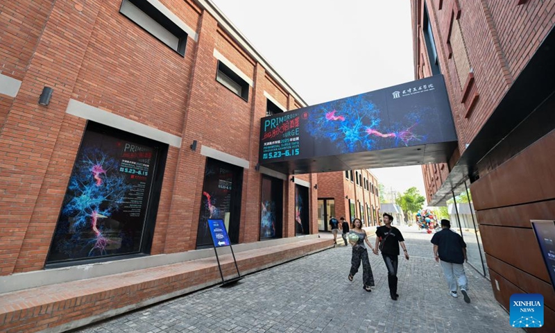 People visit a renovated exhibition area at Tianjin Academy of Fine Arts area in north China's Tianjin on June 2, 2025. (Xinhua/Sun Fanyue)