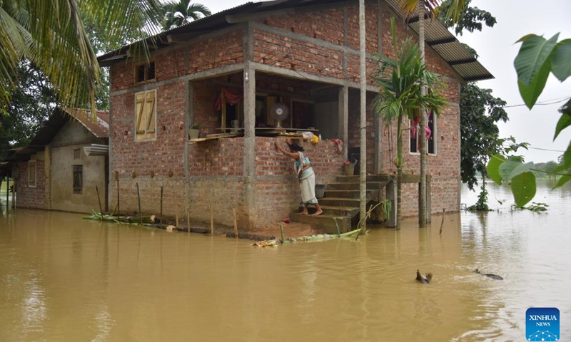A house is seen partially submerged in floodwaters after heavy rain in Nagaon district of India's northeastern state of Assam, June 2, 2025. (Str/Xinhua)