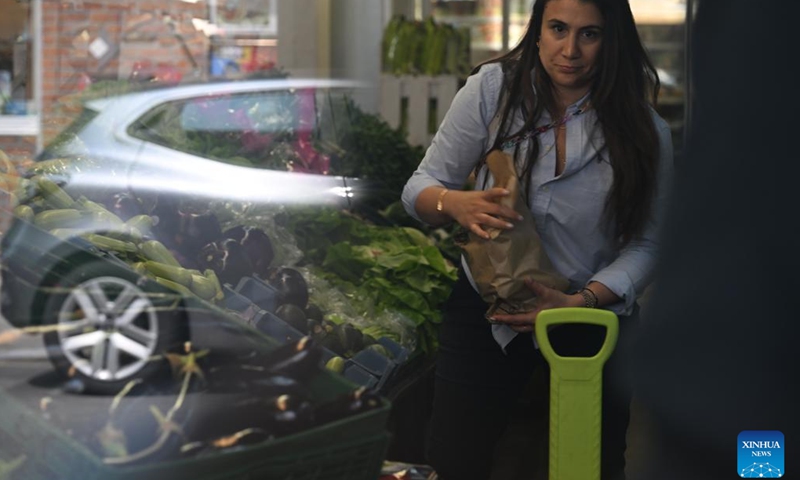 A woman shops at a supermarket in Brussels, Belgium, June 3, 2025. The Eurozone's annual inflation rate for May stood at 1.9 percent, down from 2.2 percent in April, bringing inflation back below the European Central Bank's (ECB) target of 2 percent, according to a flash estimate published Tuesday by Eurostat. (Photo by Gao Yi/Xinhua)
