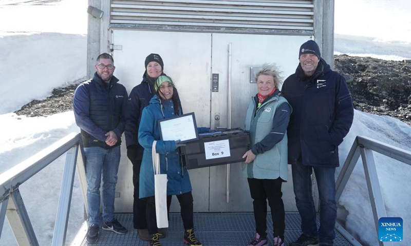 Staff members transport seed samples into the Svalbard Global Seed Vault in Longyearbyen, Svalbard, Norway, on June 3, 2025. Fourteen gene banks from around the world are depositing more than 11,200 seed samples this week at the Svalbard Global Seed Vault, underscoring the critical role of crop diversity in future food security. (Crop Trust/Handout via Xinhua)