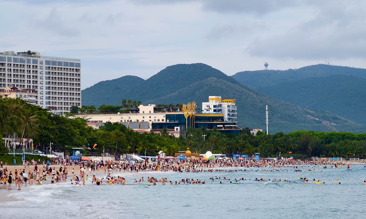People enjoy their time at a beach during the Dragon Boat Festival holiday in Sanya, South China's Hainan Province on May 31, 2025. Photo: VCG