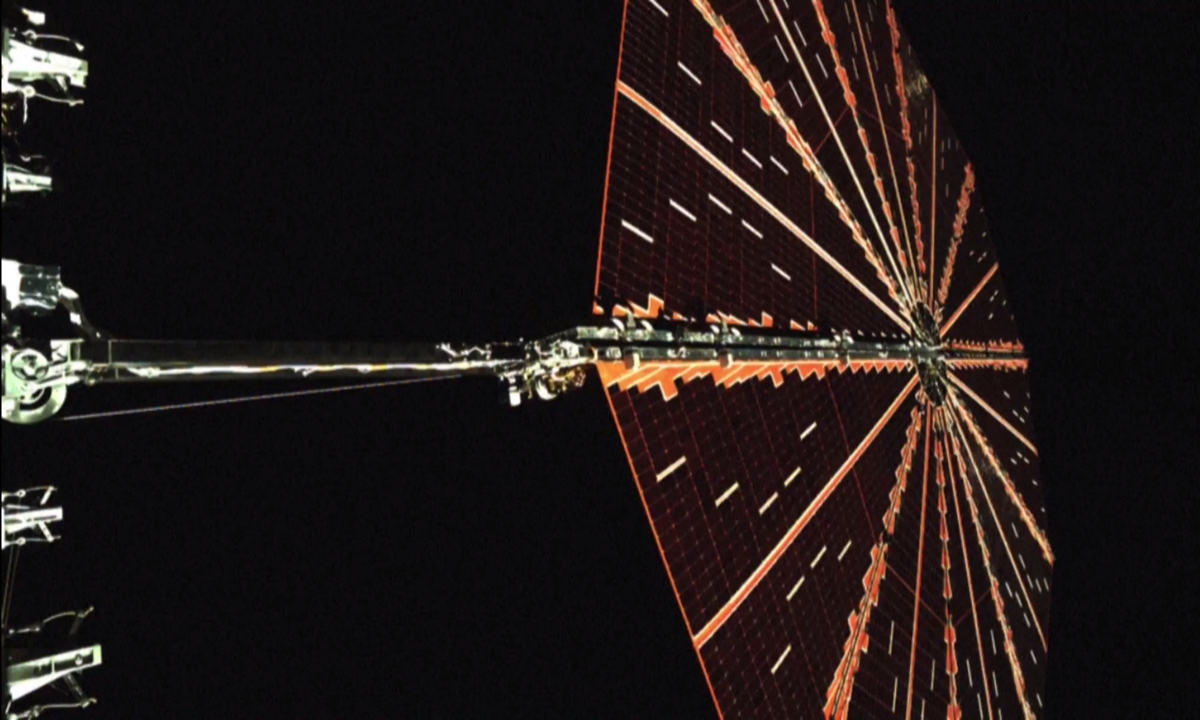 An image captured by the Tianwen-2 probe shows the unfolding of its circular solar panels, released by the China National Space Administration on June 6, 2025. China launched its first asteroid sample-return mission, Tianwen-2, on May 29. Photo: VCG