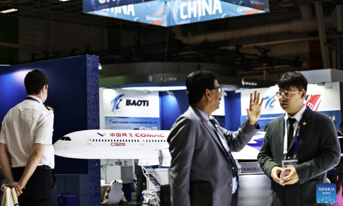 People visit the booth of Commercial Aircraft Corporation of China (COMAC) during the 55th Paris Air Show at Le Bourget Airport near Paris, France, June 17, 2025.

The 55th edition of the Paris Air Show officially opened on Monday and will run until June 22. China is showcasing some of its top aviation products at the exhibition. (Xinhua/Gao Jing)