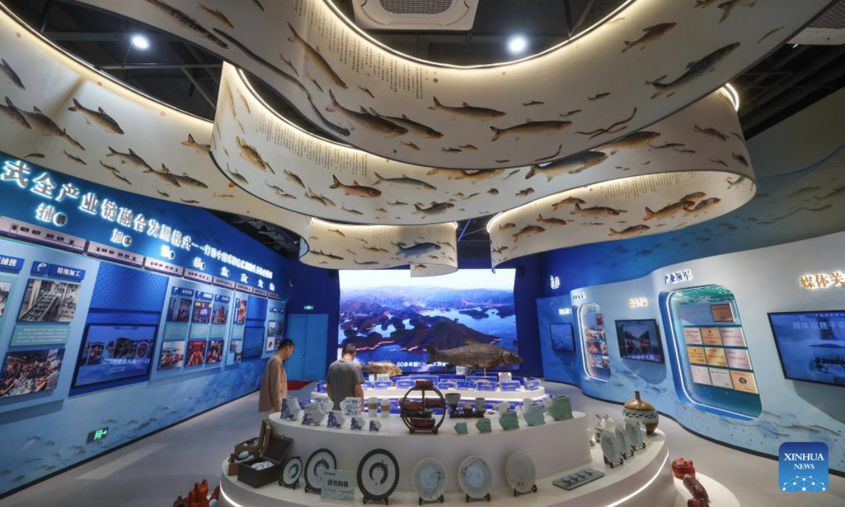 People visit the Qiandao Lake Fish Museum in Chun'an County, east China's Zhejiang Province, June 3, 2025. Chun'an, located in east China's Zhejiang Province, is renowned for its water system and outstanding natural environment. As a national-level ecological county, it serves as a model for ecological protection and construction. (Xinhua/Xu Yu)