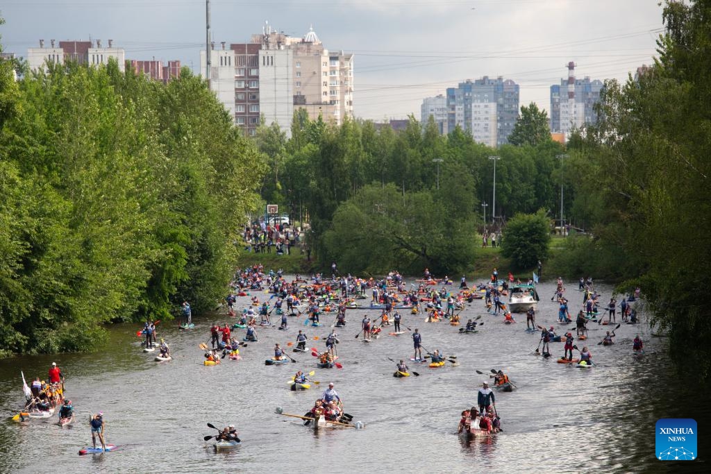 People participate in a Petrovskiy canoe marathon in St. Petersburg, Russia, June 7, 2025. The canoe marathon attracted over 3,000 participants. (Photo: Xinhua)