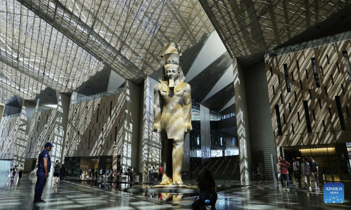 Tourists visit the Grand Egyptian Museum in Giza, Egypt, on June 12, 2025. Located near the Giza Pyramids, the Grand Egyptian Museum (GEM), spanning more than 500,000 square meters and housing over 100,000 artifacts, is set to officially open on July 3 this year. (Xinhua/Wang Dongzhen)