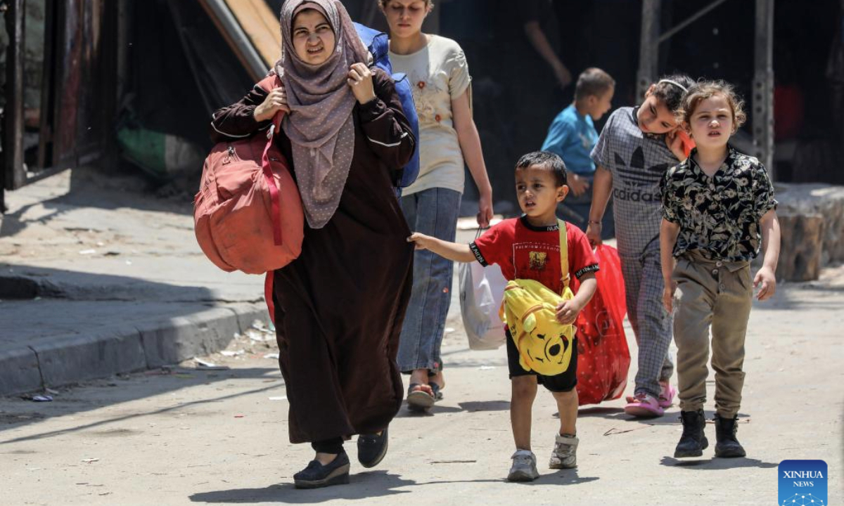 Palestinians evacuated from Jabalia in northern Gaza Strip arrive in Gaza City, on June 9, 2025. The Israel Defense Forces (IDF) on Saturday issued an evacuation warning for residents in two areas of the northern Gaza Strip ahead of strikes. The warning applies to the Abd al-Rahman neighborhood in the northwest of Gaza City and the Nahda neighborhood in the Jabalia refugee camp, IDF spokesperson Avichay Adraee announced on social media platform X. (Photo by Rizek Abdeljawad/Xinhua)