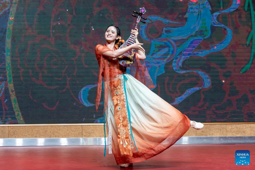 A contestant performs during the Lao Regional Final of the 24th Chinese Bridge Chinese Proficiency Competition for Foreign College Students in Vientiane, Laos, June 6, 2025. (Photo: Xinhua)