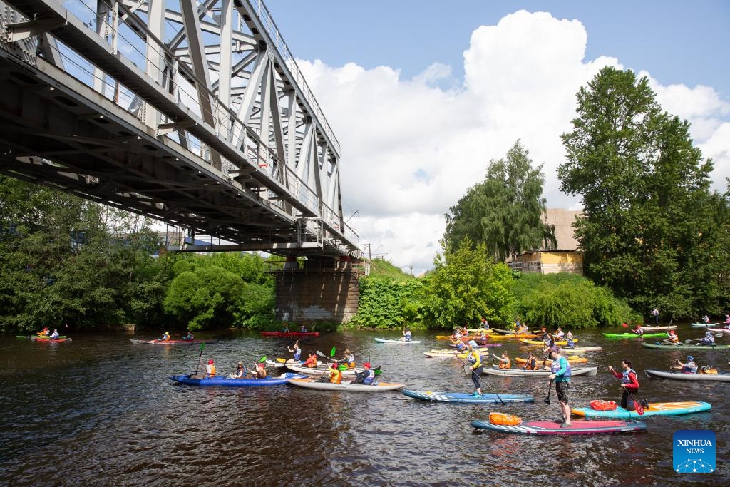 People participate in a Petrovskiy canoe marathon in St. Petersburg, Russia, June 7, 2025. The canoe marathon attracted over 3,000 participants. (Photo: Xinhua)