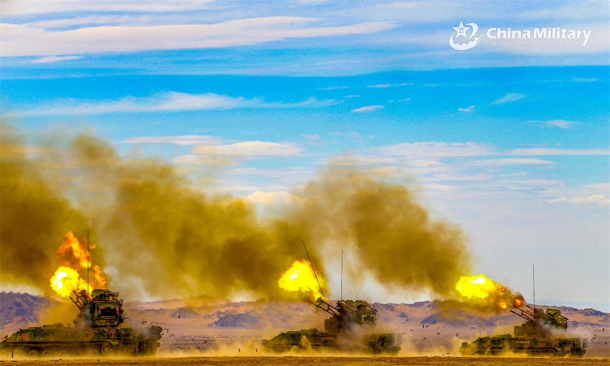 Anti-aircraft guns attached to an anti-aircraft artillery element with the army under the Chinese PLA Eastern Theater Command fire at the mock targets during a live-fire shooting training exercise on June 4, 2025. (eng.chinamil.com.cn/Photo by Zhang Mao)