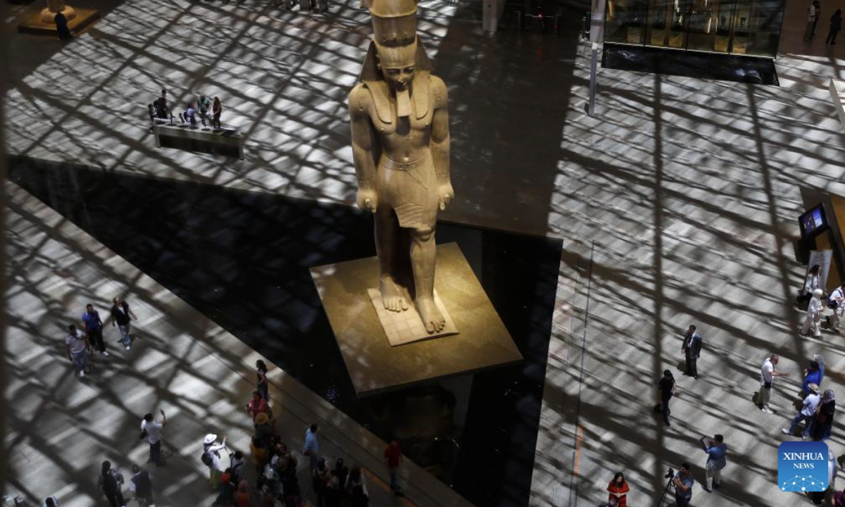 Tourists visit the Grand Egyptian Museum in Giza, Egypt, on June 12, 2025. Located near the Giza Pyramids, the Grand Egyptian Museum (GEM), spanning more than 500,000 square meters and housing over 100,000 artifacts, is set to officially open on July 3 this year. (Xinhua/Wang Dongzhen)